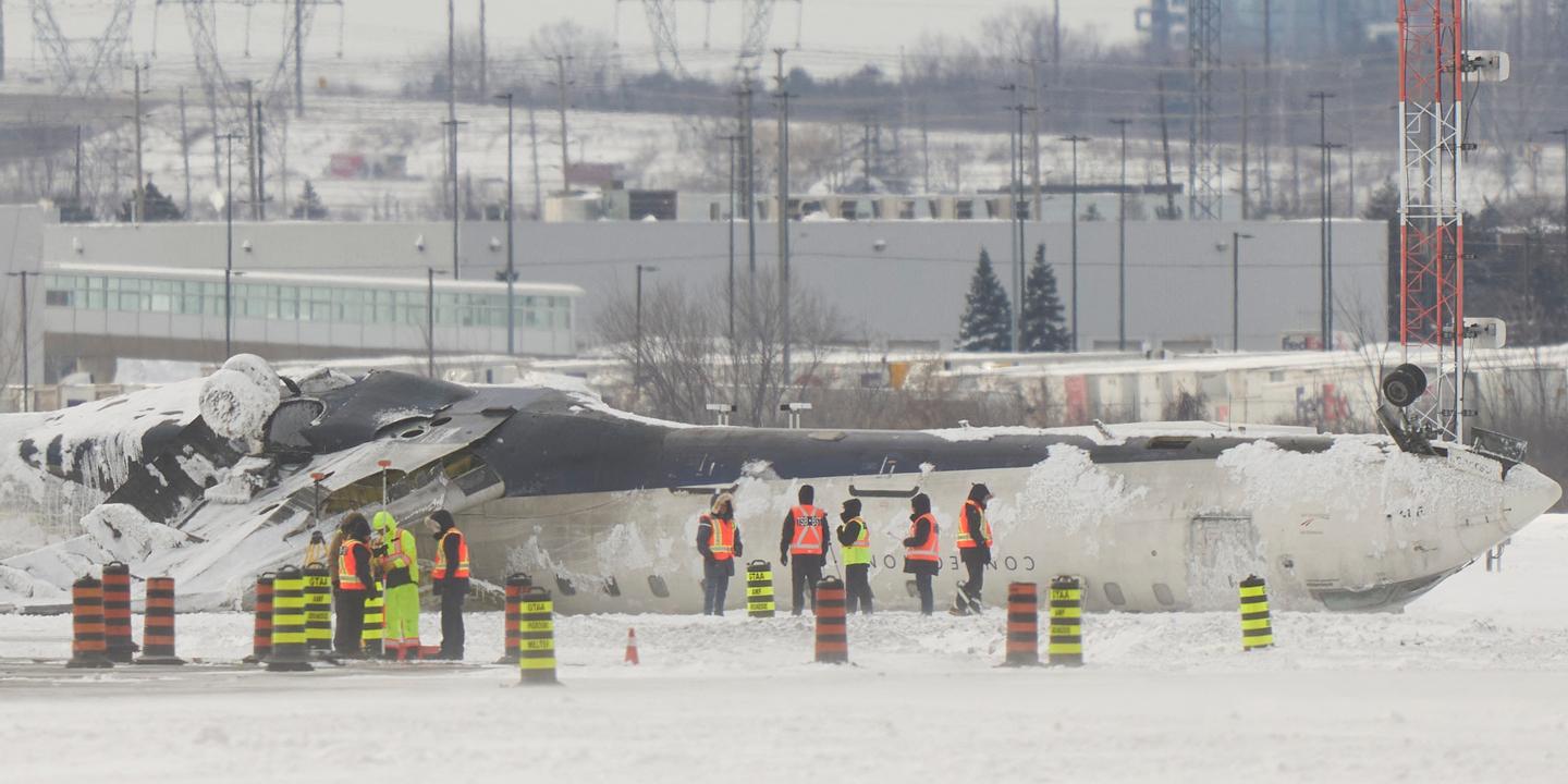 Toronto Havalimanı, Uçak Kazası, Delta Air Lines, Bombardier CRJ900, Kanada Ulaşım Güvenliği Kurulu (TSB), Uçak Kazası Soruşturması, Yaralılar, Duman, Yangın, Kar Fırtınası, Kokpit Kayıt Cihazı, Uçuş Veri Kayıt Cihazı, Yolcu İfadeleri, Ekip Övgüsü