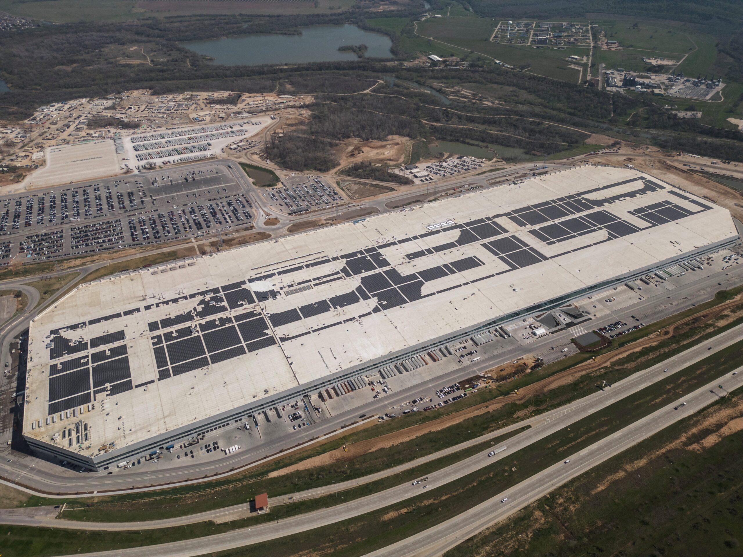 Tesla, TSLA, megafabrika, Houston, batarya depolama tesisi, Electrek, Waller County, Teksas, vergi indirimi, Megapack, enerji ürünleri, Katy, tesis iyileştirmeleri, imalat ekipmanları, Elon Musk, ekonomik kalkınma ortaklığı, EV işi, güneş enerjisi, batarya işi, gigafactory, Çin, tedarik zinciri, lityum-iyon piller, iş yaratma, Zaheer Kachwala, Alan Barona
