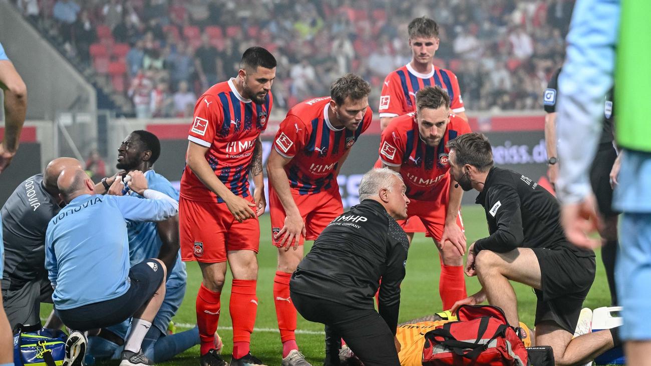 Kevin Müller, 1. FC Heidenheim, VfL Bochum, Bundesliga, Futbol, Kaleci, Sakatlık, Ibrahima Sissoko, Frank Feller, Ambulans, Maç, Haber, Alman Futbolu, Sağlık, Stad, Taraftar, Destek
