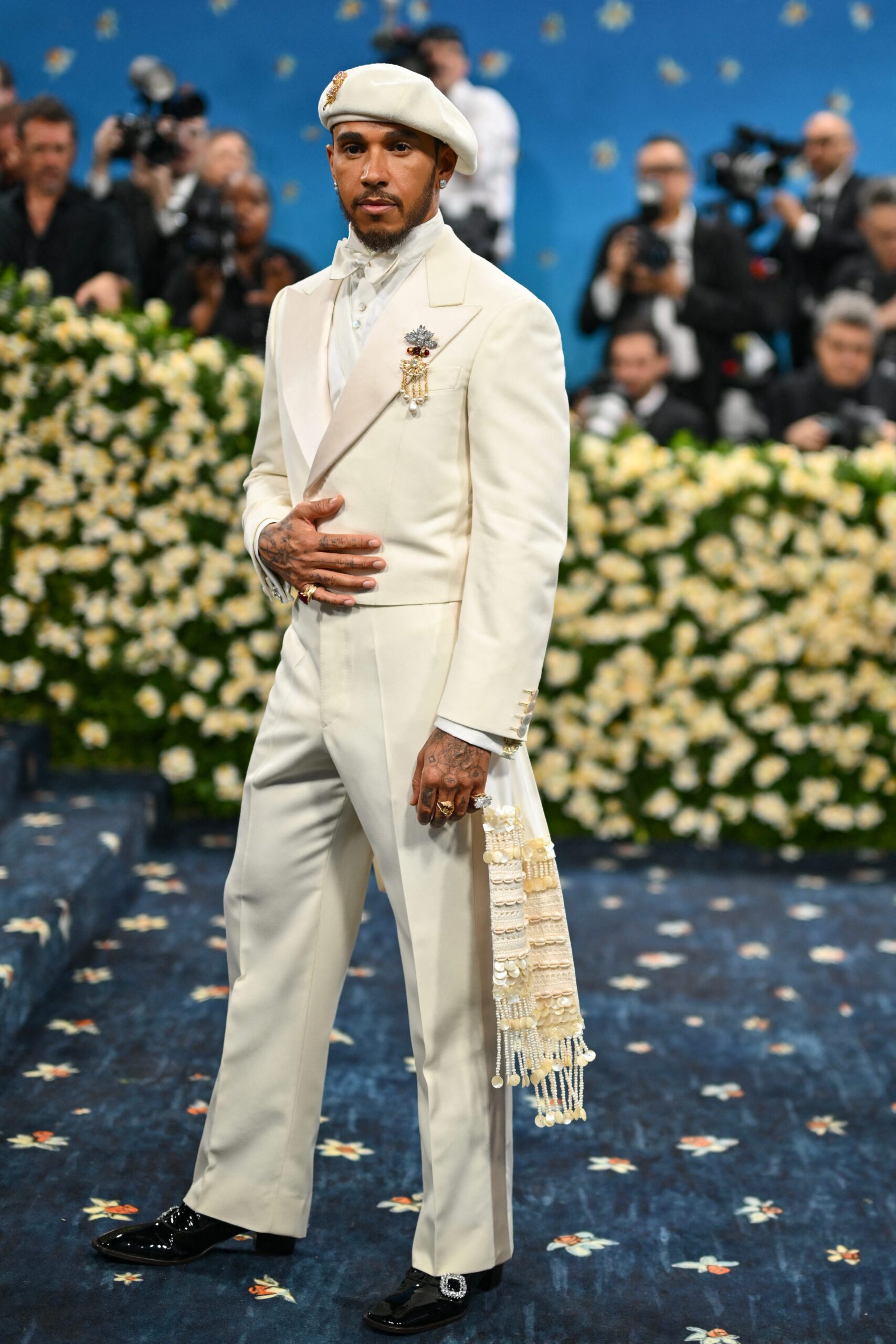 Met Gala 2025, sports stars, fashion review, Noah Lyles, Serena Williams, Lewis Hamilton, Dwyane Wade, Simone Biles, Saquon Barkley, Joe Burrow, Kristen Stewart, Angel Reese, Colin Kaepernick, Sha'Carri Richardson, Justin Jefferson, Met Gala outfits, celebrity fashion, worst dressed, best dressed, red carpet fashion, fashion critique, Superfine: Tailoring Black Style, Cheeto dust
