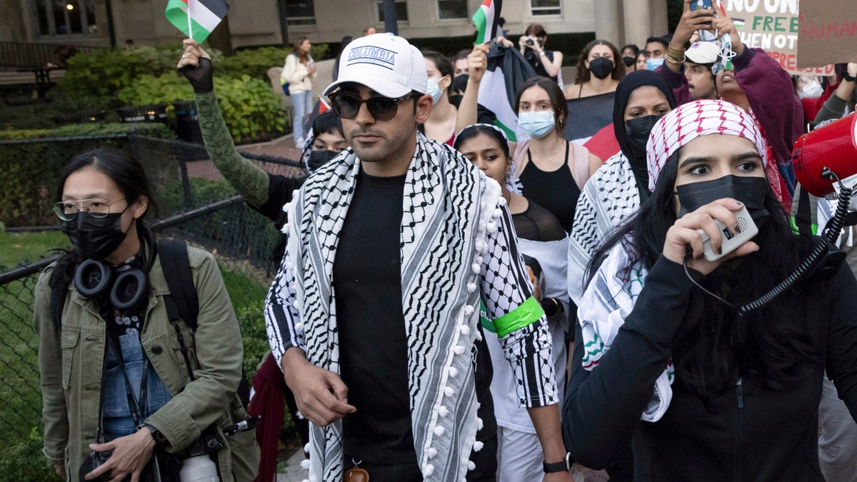 Mohsen Mahdawi, Columbia University, ICE, FBI, antisemitism, gun shop, Palestinian Student Union, Mahmoud Khalil, deportation, Trump Administration, immigration, West Bank, Buddhism, conflict resolution, Hamas, pro-Palestinian, Windsor Vermont, Precision Museum
