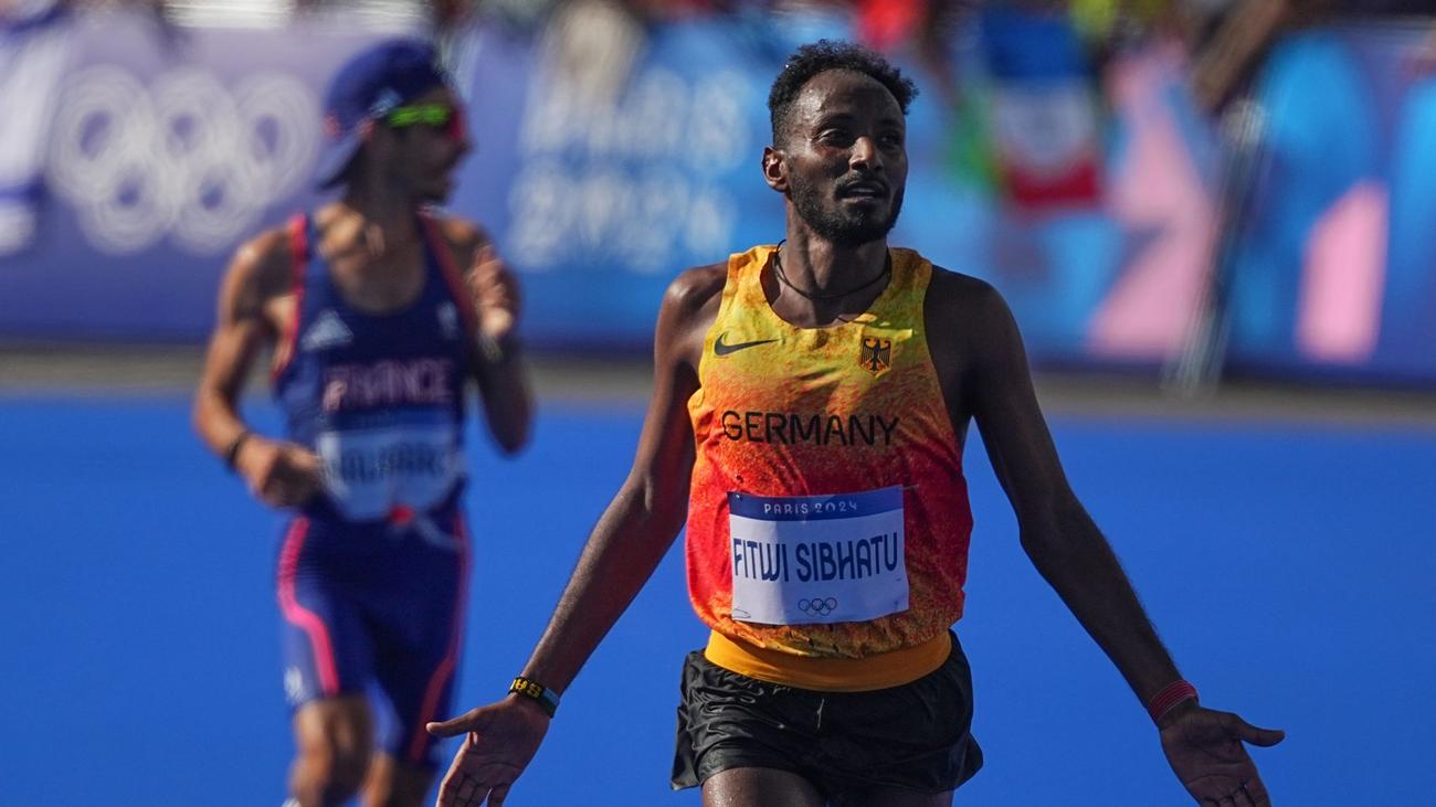 Samuel Fitwi, Almanya, maraton, rekor, atletizm, dünya şampiyonası, Tokyo, DLV, şehir maratonu, koşu, Valencia, Amanal Petros, finansal, spor, karar, Berlin Maratonu
