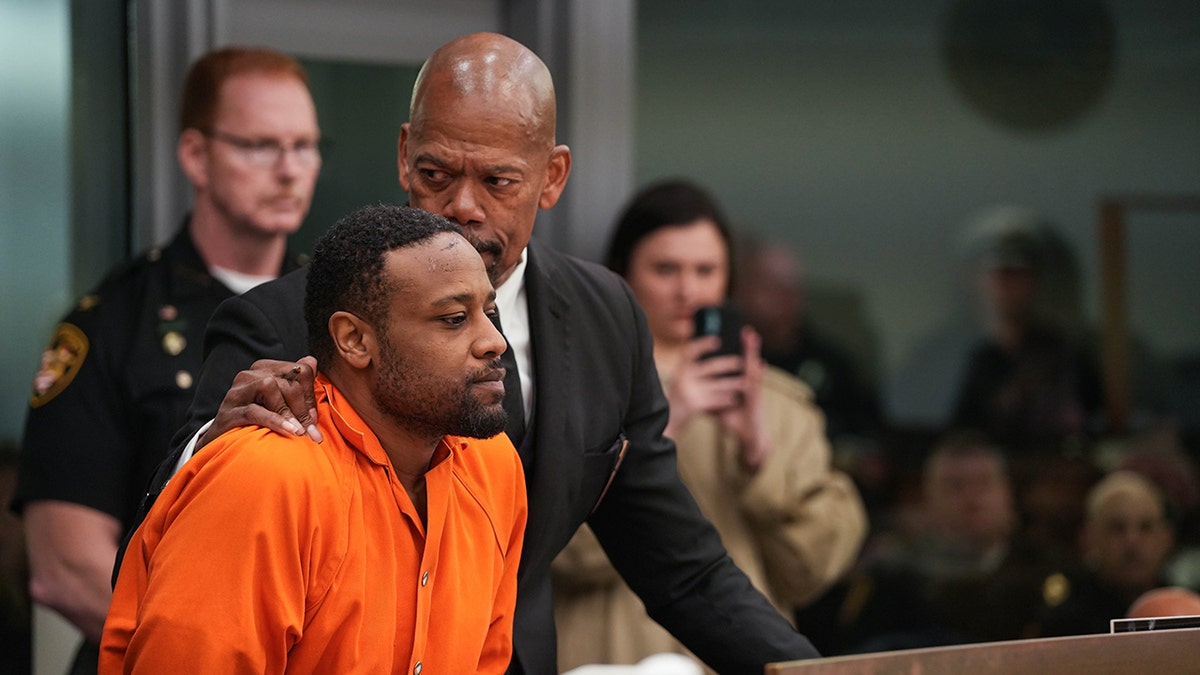 Rodney Hinton Jr., Hamilton County Sheriff's Deputy Larry Henderson, Ryan Hinton, Cincinnati Police Department, Ohio, courtroom disturbance, bond hearing, aggravated murder, mental health treatment, stolen vehicle, police shooting, bodycam video, Cochran Firm, Ohio Fraternal Order of Police, Jay McDonald, Hamilton County Sheriff Charmaine McGuffey, police pursuit, GoFundMe, police officer, graduation ceremony, fatal shooting, law enforcement, traffic detail, investigation, officer-involved shooting, police bodycam footage, stolen vehicle incident
