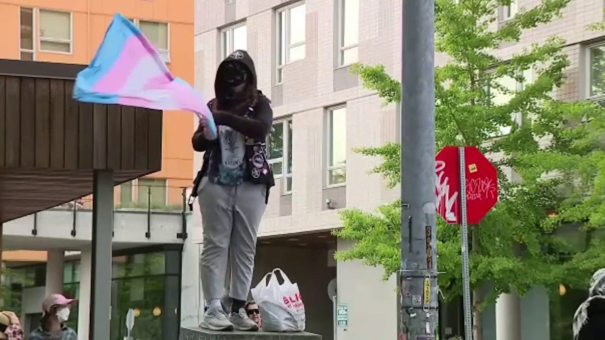 Riley Gaines, Olivia Krolczyk, Turning Point USA, TPUSA, University of Washington, UW, protest, feces, transgender, women's sports, biological men, free speech, Antifa, anti-Israel protest, Boeing, divestment, Seattle, Washington, violence, harassment
