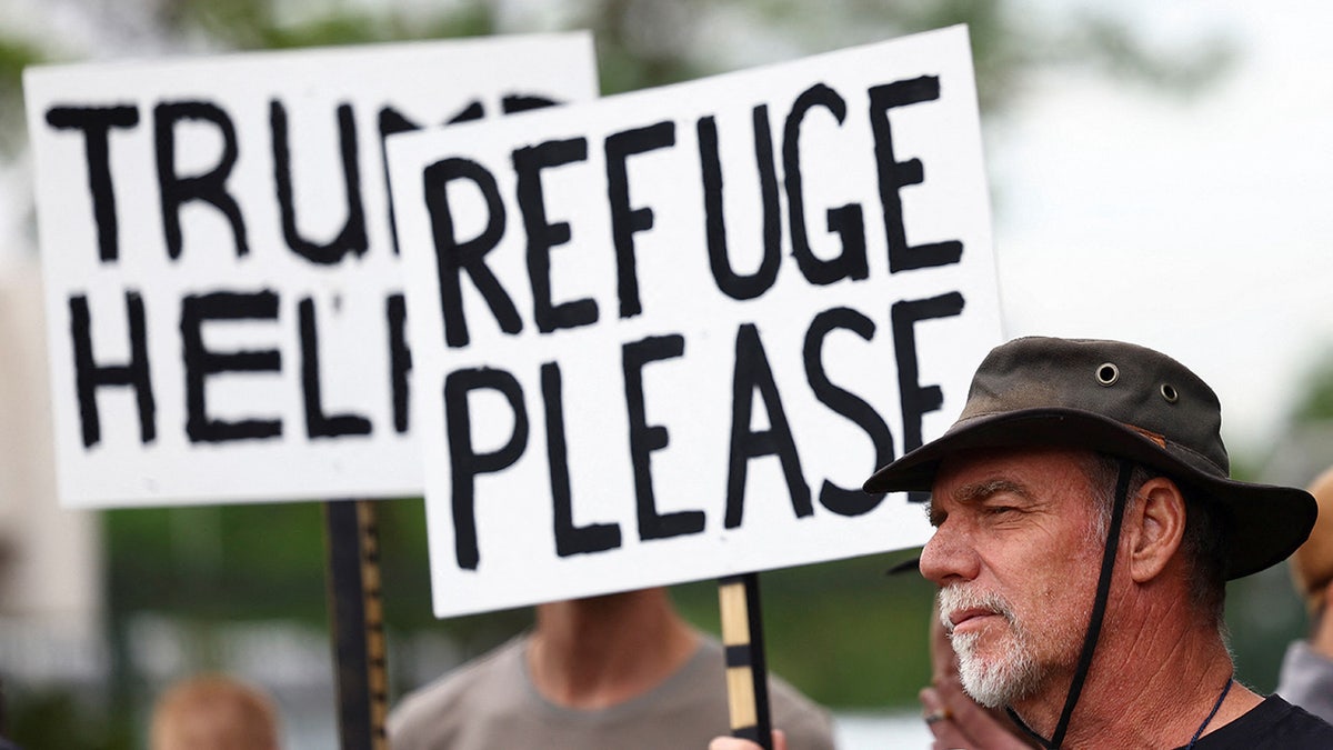 Afrikaner refugees, South Africa, United States, Trump administration, refugee resettlement, racial discrimination, Stephen Miller, land expropriation, Afrikaners, Dutch settlers, South African government, colonialism, apartheid, Minnesota, Idaho, Alabama, Marco Rubio, South African ambassador, race-baiting, political motivation, constitutional democracy
