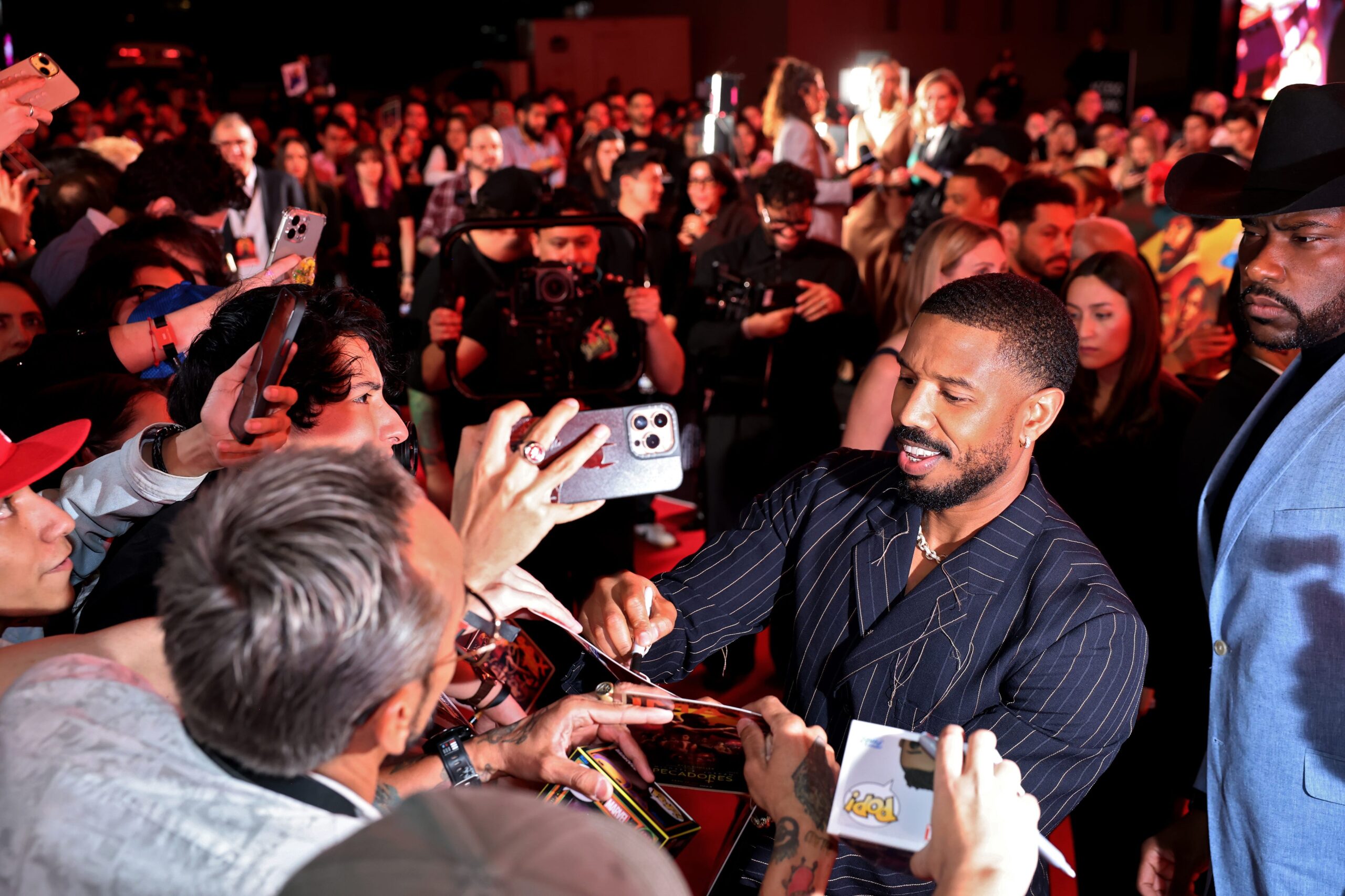 Ryan Coogler, Sinners, IMAX 70mm, Michael B. Jordan, vampire movie, Club Juke, Jesse Ehrman, box office hit, Christopher Nolan, Emma Thomas, IMAX film cameras, period action horror, film school, 70mm screenings, movie theaters, film format, moviegoing experience
